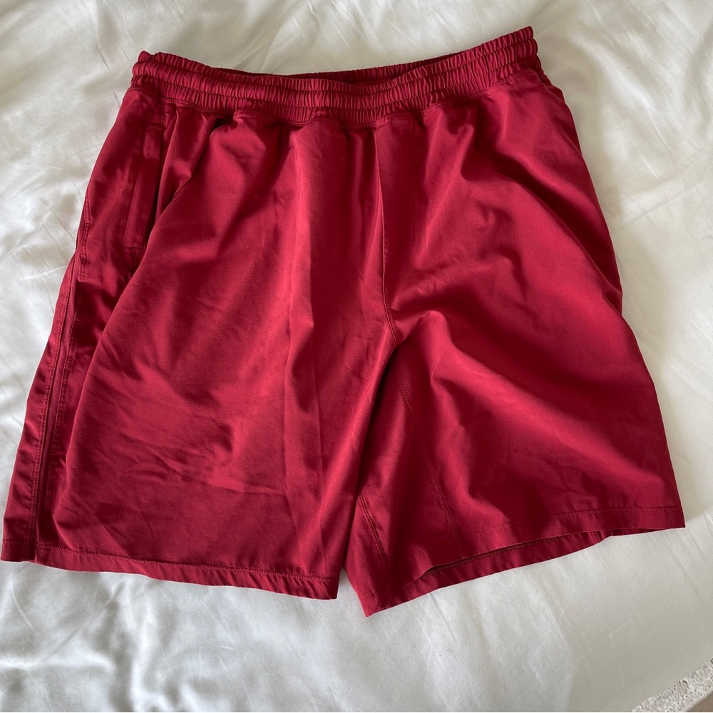 Red 9” pace breaker shorts